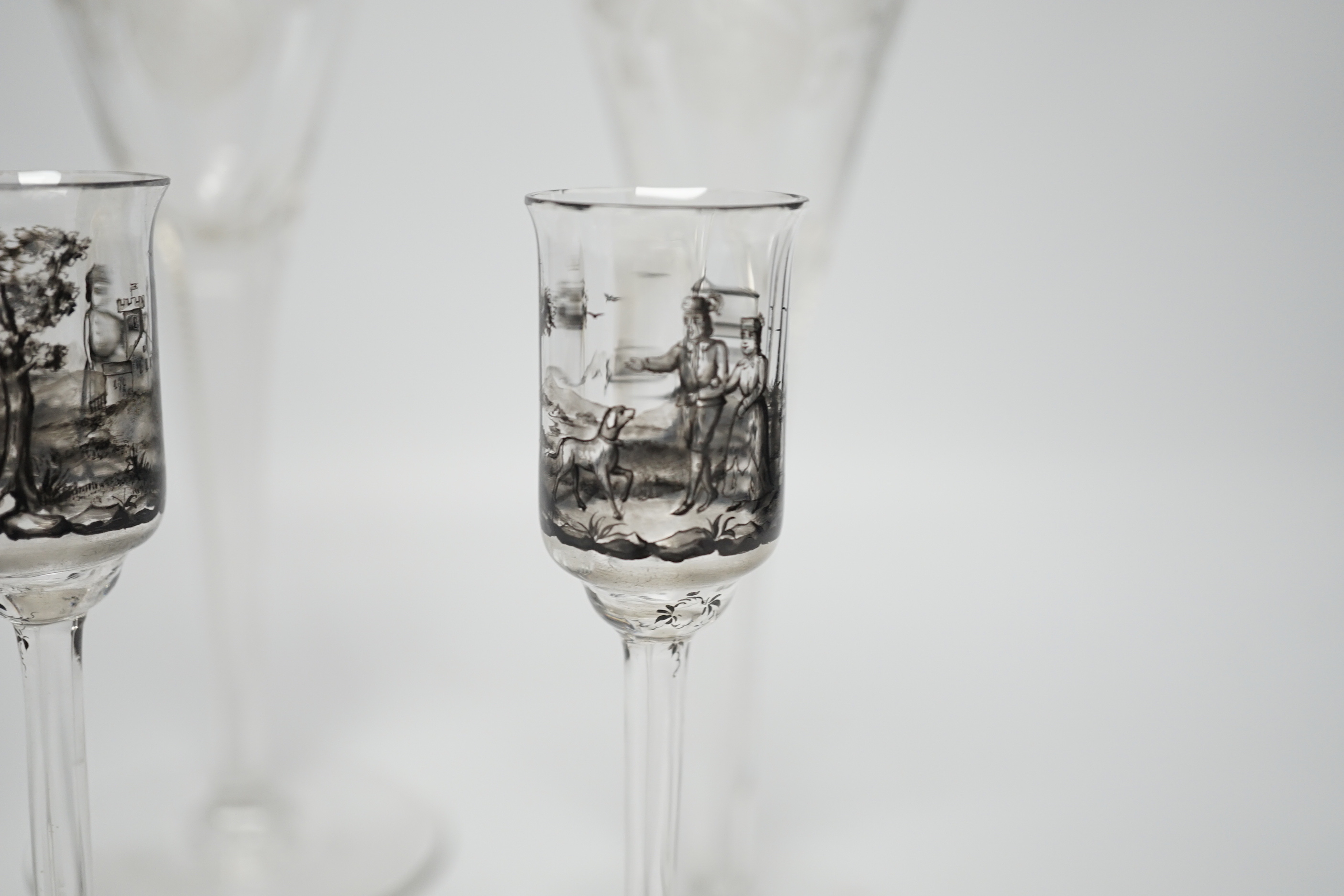 Set of three armorial crest etched flutes and three enamelled liqueur glasses, largest, 23cm high